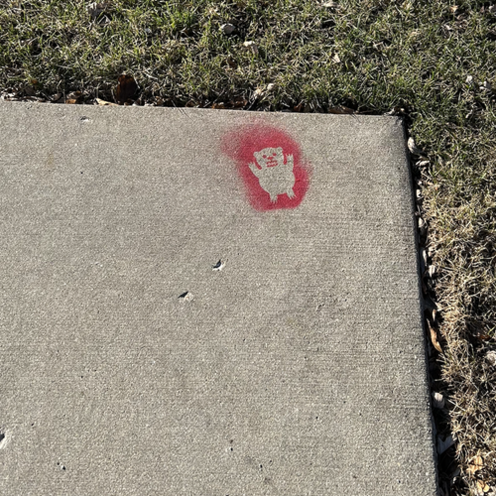 Photo of red bear
stencil on corner without a ramp